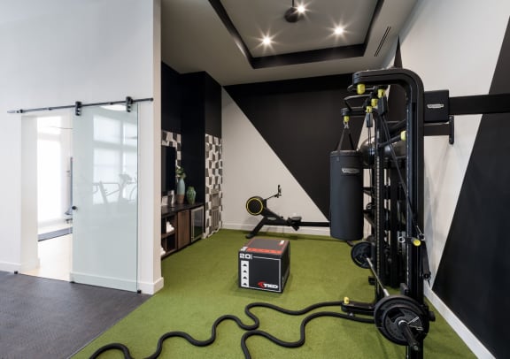 Fitness Center with free weights at Berkshire Pullman, Frisco